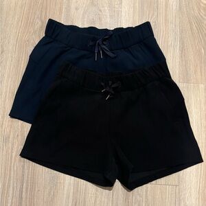 2 PAIR-Lululemon Size 4 shorts (Navy and Black)